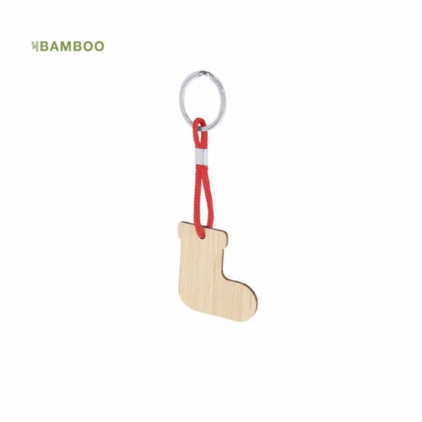 Wooden stocking-shaped keychain with a red loop and silver ring, labeled BAMBOO.