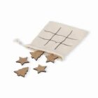 Cloth bag with tic-tac-toe grid, cork stars, and tree pieces spilling out.