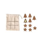 A fabric bag with a tic-tac-toe grid and cork tree and star pieces beside it.