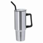 Tall silver travel tumbler with black handle, lid, and black straw against a white background.