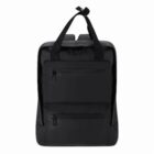 A plain black backpack with two front zippered pockets and two top handles.