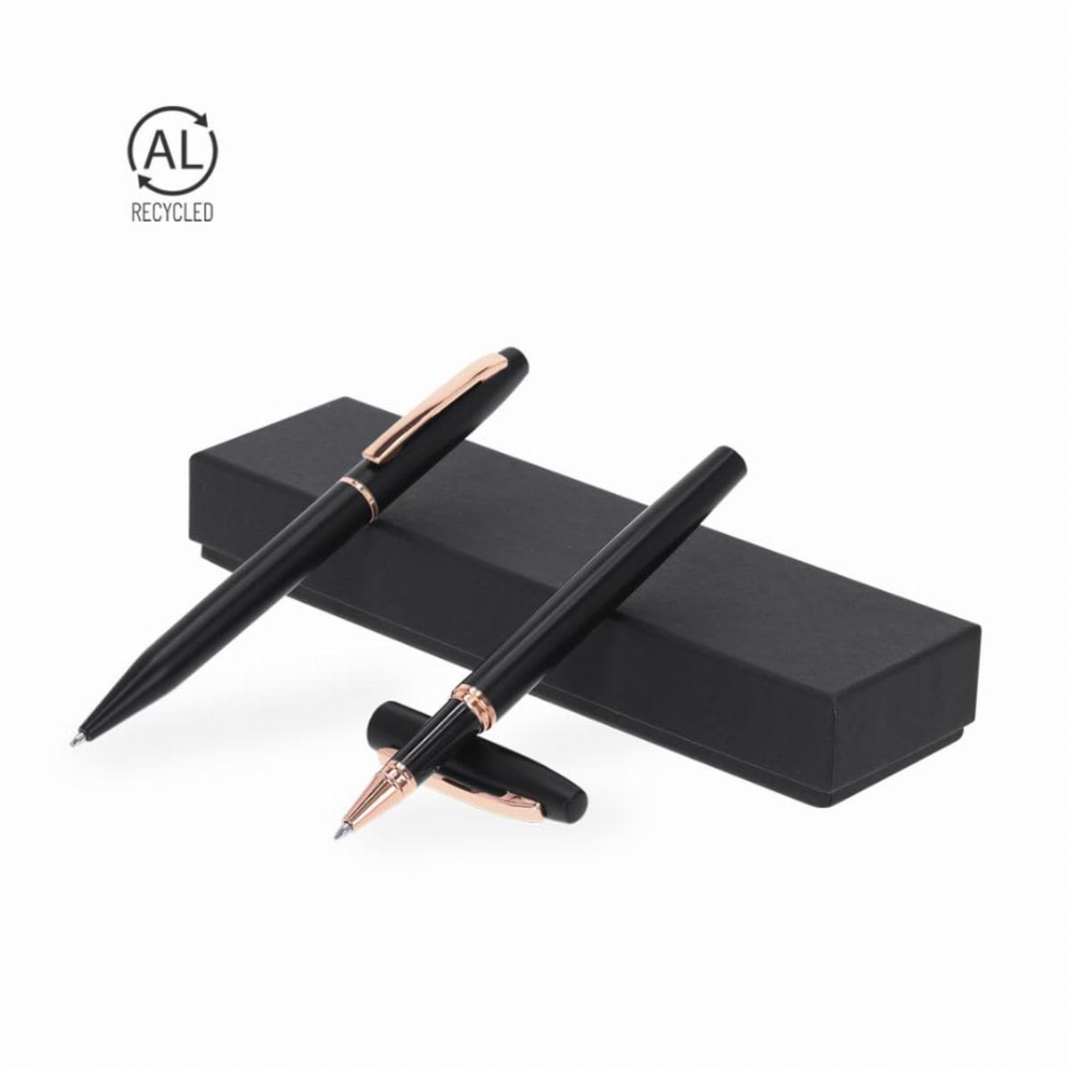 Two black pens with gold clips on a black box, with a recycled symbol in the corner.