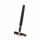 Black and gold pen with its cap off, standing upright on a white background.