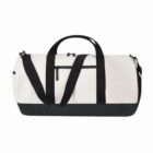White duffel bag with black handles, strap, and base, featuring a front zipper pocket.