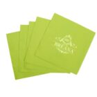 Five lime green napkins, one with a decorative BE BREANA design in white.