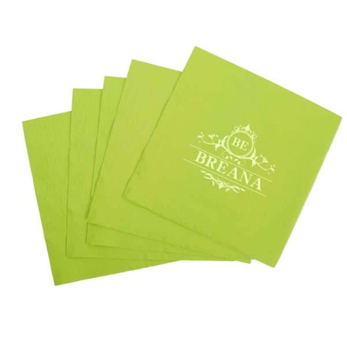 Five lime green napkins, one with a decorative BE BREANA design in white.