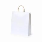 A plain white paper shopping bag with brown handles on a white background.