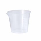 Transparent plastic measuring cup with a spout, marked with measurement lines.