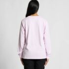Person with long dark hair wearing a light pink long-sleeve shirt, seen from the back.