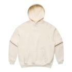 Cream-colored hooded sweatshirt with a front pocket, laid flat on a white background.
