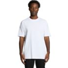 Man wearing a plain white t-shirt and black pants, standing against a white background.