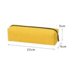 Yellow rectangular pencil case with zipper, dimensions 22cm x 6cm x 5cm shown.