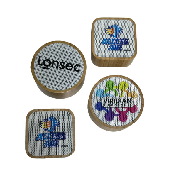 four speakers printed with different company logos