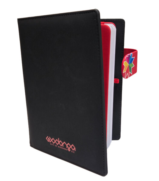 black diary with red interior and logo at the bottom