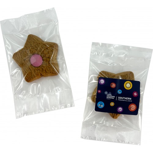 Gingerbread Star Cookies with pink centers, each wrapped in clear plastic.