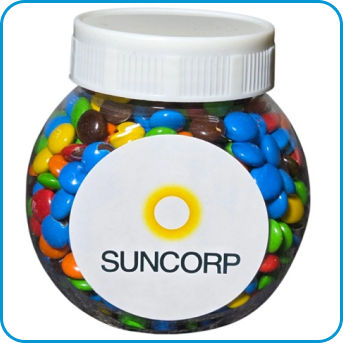 A round jar filled with colorful candies labeled SUNCORP and a yellow sun graphic.