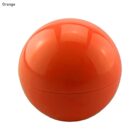An orange Pod Lip Balm Ball sits against a white background, shiny and smooth.