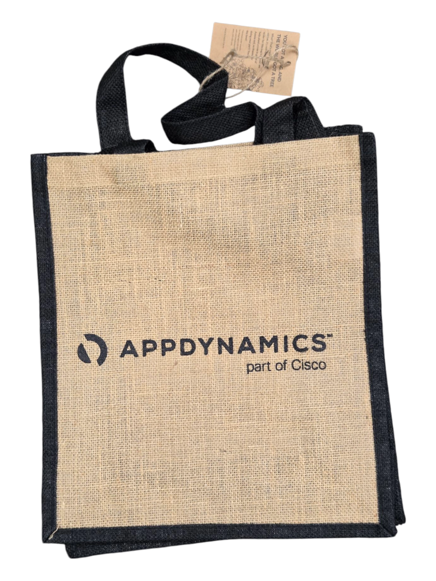 A canvas tote bag with black handles and the AppDynamics part of Cisco logo on it.