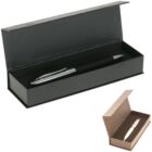 Black pen in an open black case, with a smaller image of a white pen in a beige case.