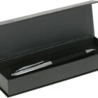 Black pen with silver accents in an open black rectangular gift box.