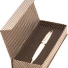 A white and gold pen in an open checkered gift box with black foam lining.