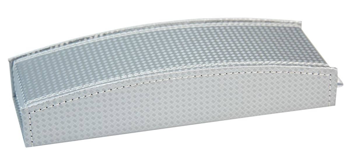 A rectangular, silver, textured case with a curved top and stitched edges.