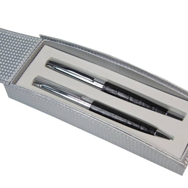 A gift box with two black and silver pens inside.