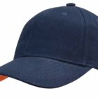 A dark blue baseball cap with an orange underside on the brim.
