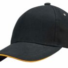 Black baseball cap with a yellow trim along the edge of the visor, shown on a white background.