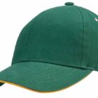 Green baseball cap with a yellow trim on the brim, viewed from an angle.