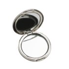 A silver compact mirror open to reveal two round mirrors inside.