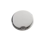Round silver compact mirror with a clasp, closed, on a white background.