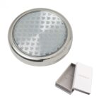 Round silver compact mirror with patterned lid, shown next to an open white gift box.