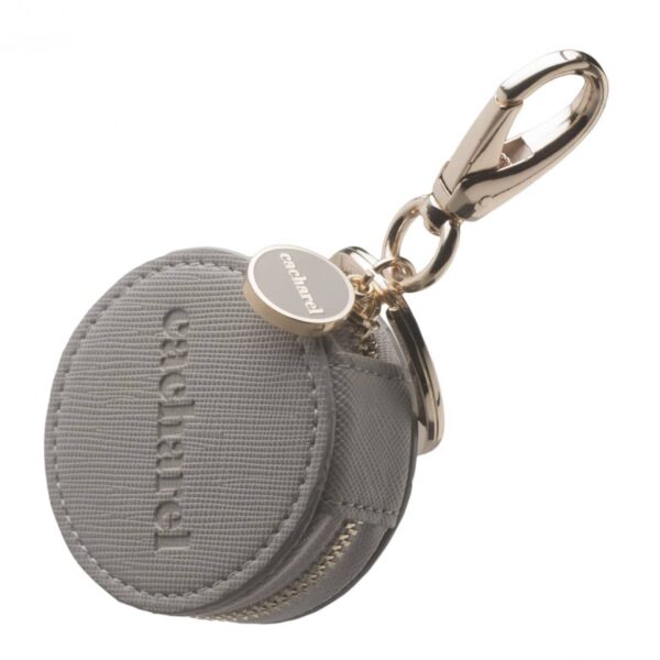 Round gray fabric keychain pouch with zipper and metallic clip, embossed with cacharel.