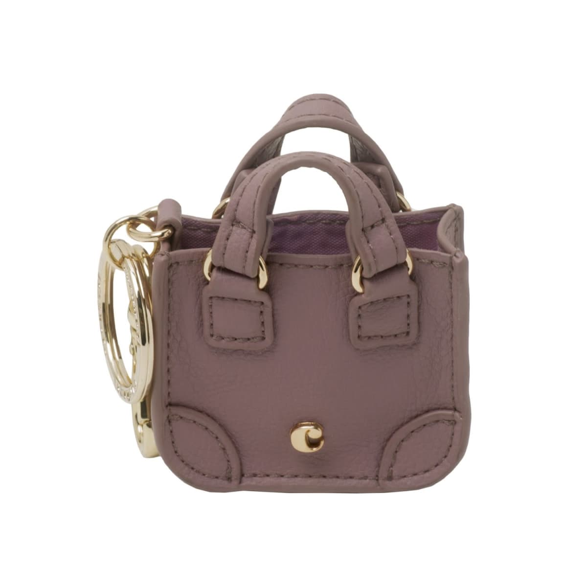 Small mauve handbag keychain with gold hardware and stitched details.