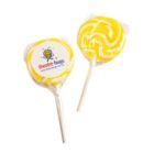 Two yellow and white swirl lollipops with theatre bugs logo stickers on the wrappers.