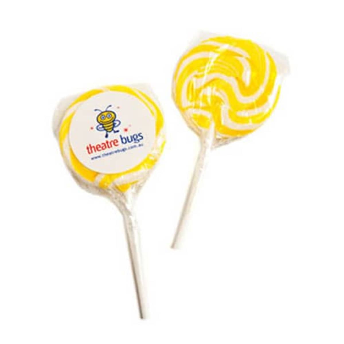 Two yellow and white swirl lollipops with theatre bugs logo stickers on the wrappers.