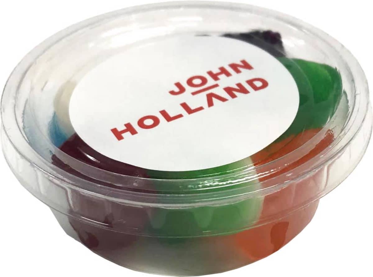 Small plastic container of gummy candies with John Holland label on the lid.