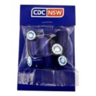 A blue packet labeled CDC NSW containing several dark-colored plastic bottle caps.