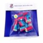 A clear bag of colorful candy pieces on a blue and white background.