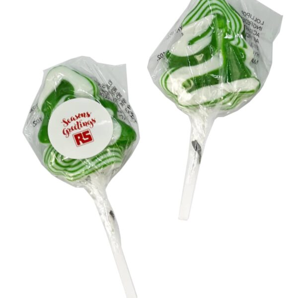 Two green and white lollipops shaped like Christmas trees, wrapped in plastic.