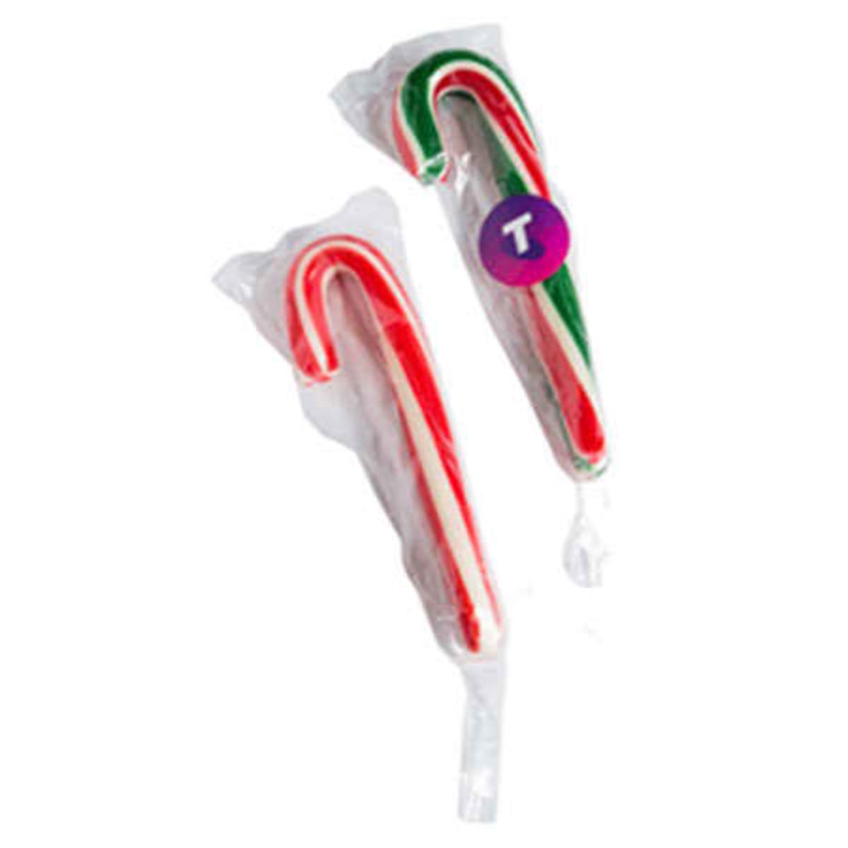 Two wrapped candy canes, one red and white, one red, green, and white, on a white background.