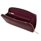 Open maroon leather wallet with zippered compartments and gold zipper detail.