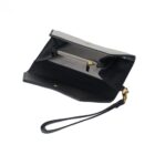 Black wristlet clutch bag open to show interior compartments and a zippered pocket.