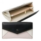 Black and white leather wallet, shown open and closed, with gold zipper and snap.