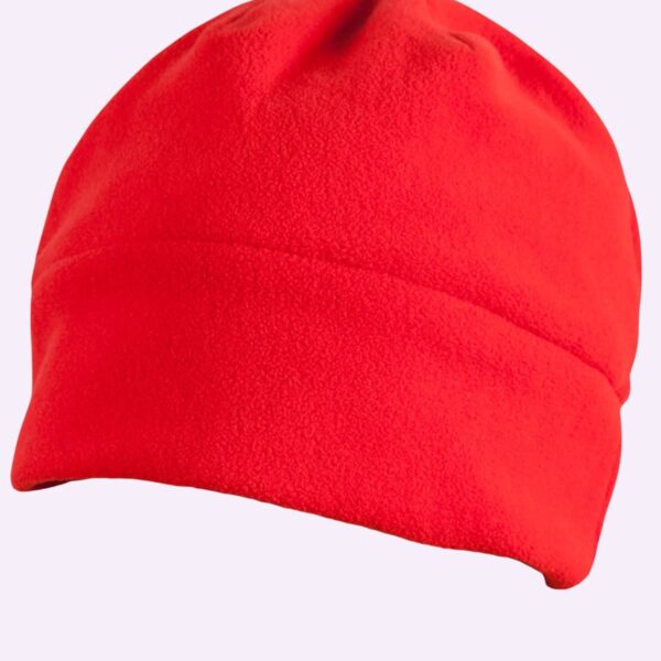 Bright red fleece beanie hat on a plain light background.