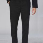 Person wearing black cargo pants and black shoes, standing with one hand in a pocket.