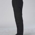 Person wearing black cargo pants and black shoes, shown from the side against a plain background.
