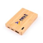 Bamboo power bank with next OFFICE SUPPLIES logo printed on top.