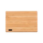 Rectangular bamboo cutting board with a small hole in one corner, on a white background.